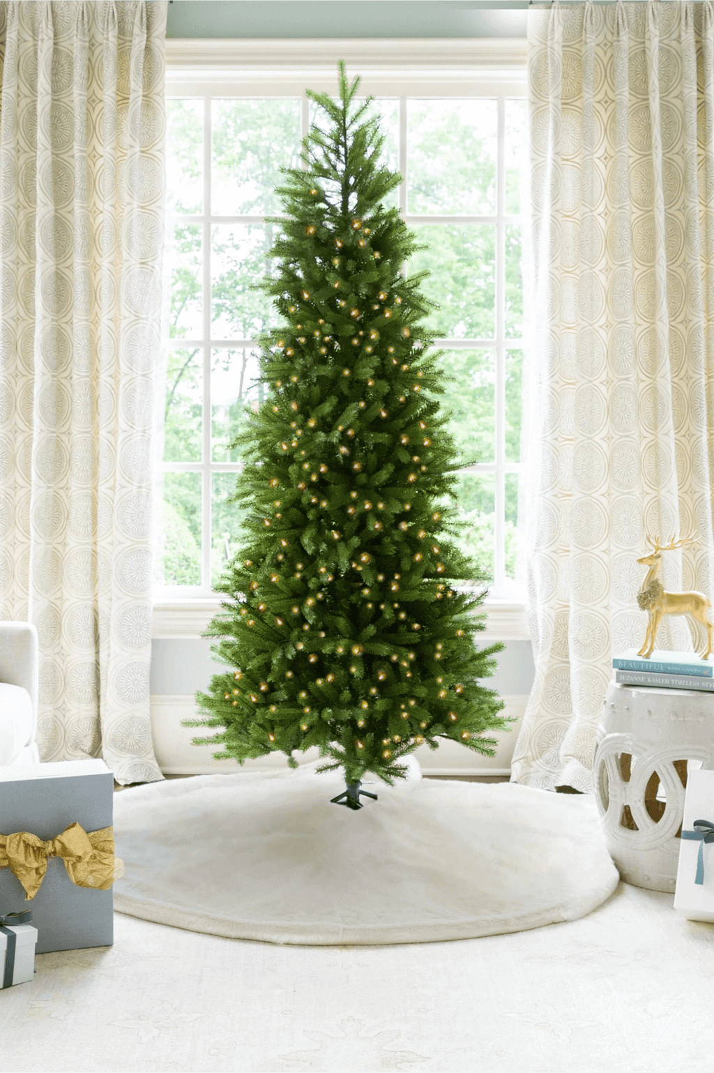 The Dynamic Fraser One Plug RGBWW LED Slender Tree, is a hassle-free and  beautifully crafted Christmas Tree that changes colors and patterns with a  simple remote control. This 10ft tree features 3774