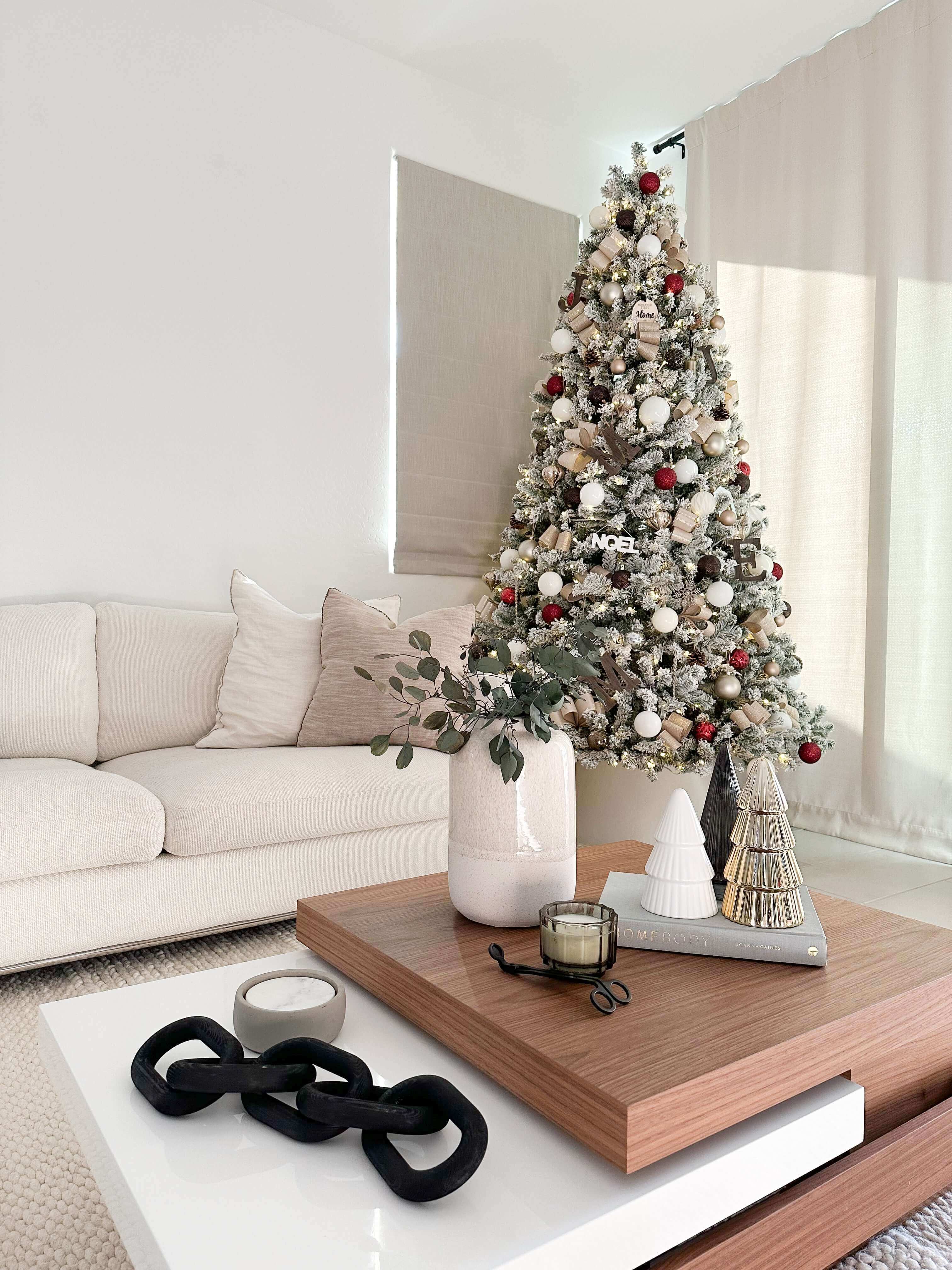 Small artificial christmas store tree with lights